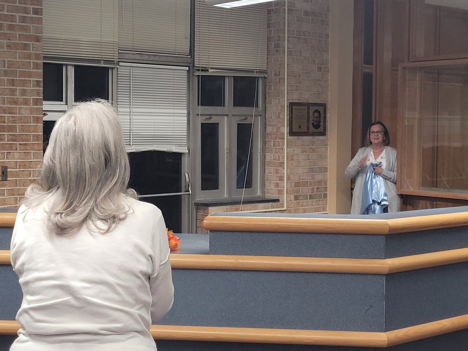 HER SON: Sallyann DiIorio watches in disbelief, as a plaque in memory of her son was unveiled at a special tribute held last Thursday in the Johnston High School library.